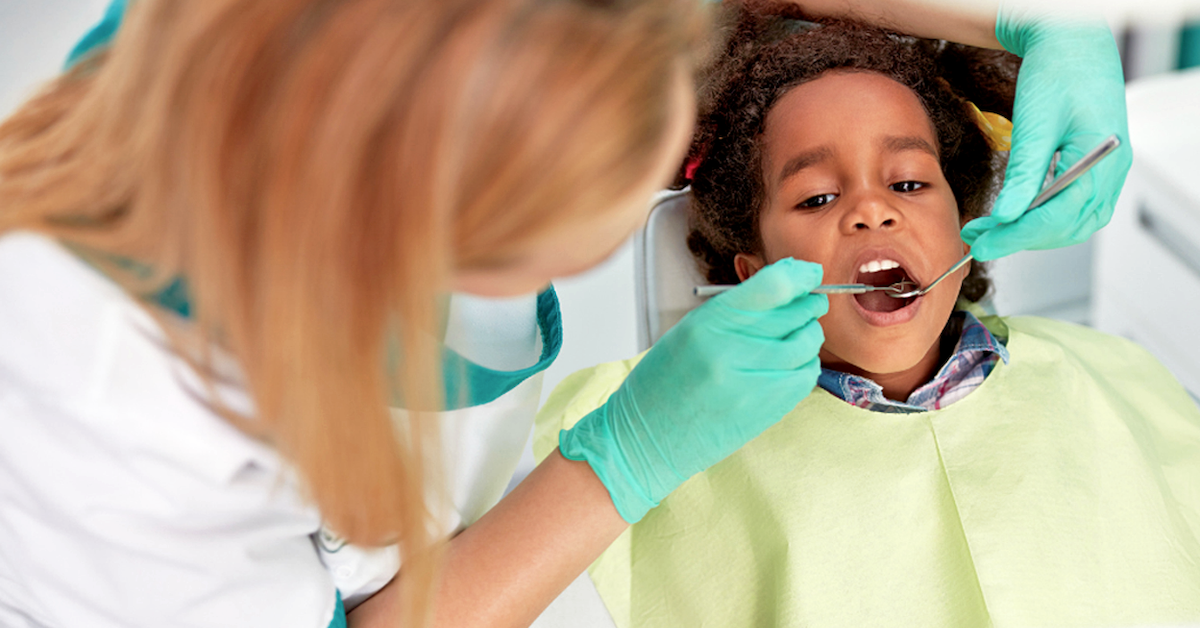 Child receiving gentle dental care at Augusta Children's Dental Center